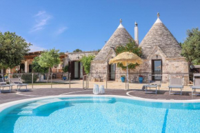 Trulli Ericla con campo da tennis